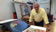 Steve Meadows, an architect, actor, inventor and dabbler in art, poses in his Venice, California, home on February 14, 2017, with two paintings he shipped to the Van Gogh Museum in Amsterdam for an authentication review as possible works by the Dutch mast