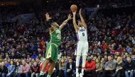 Philadelphia 76ers forward Dario Saric (9) shoots the ball as Boston Celtics center Al Horford (42) defends during the fourth quarter of the game at the Wells Fargo Center. The 76ers won 105-99.Credit: John Geliebter
