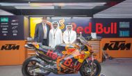 Abdulrahman Al Mannai; President of Qatar Motor and Motorcycle Federation (QMMF), Willy Kempel; Austrian Ambassador to Qatar, and Khalid Al Remaihi; Vice President and GM of Losail Circuit Sports Club during the launch of the Red Bull KTM Factory Racing i