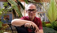 French photographer Youri Lenquette poses on March 4, 2017 at his home in the Senegalese capital Dakar. AFP / SEYLLOU