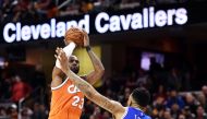 Cleveland Cavaliers forward LeBron James (23) shoots over the defense of Philadelphia 76ers forward Shawn Long (36) during the second half at Quicken Loans Arena. The Cavs won 122-105. Ken Blaze
