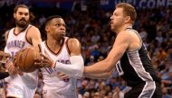 Oklahoma City Thunder guard Russell Westbrook (0) drives to the basket in front of San Antonio Spurs forward David Lee (10) during the second quarter at Chesapeake Energy Arena. Mark D. Smith
