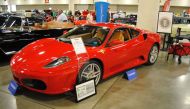 A Ferrari F430 owned by US president Donald J. Trump in 2007 is exhibited by Autcions America in Fort Lauderdale, Florida on March 31, 2017. AFP / Leila Macor 