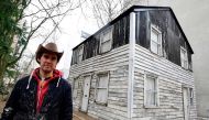 This file photo taken on March 29, 2017 shows artist Ryan Mendoza as he poses in front of Rosa Parks' house during an AFP interview in Berlin. AFP / Tobias Schwarz