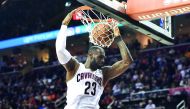 Cleveland Cavaliers forward LeBron James slam dunks during the second half of NBA game against the Orlando Magic at Quicken Loans Arena on Wednesday. 