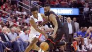 Detroit Pistons forward Stanley Johnson (7) and Houston Rockets guard James Harden (13) reach for a loose ball in the second half at Toyota Center. Detroit Pistons won 114-109 .Credit: Thomas B. Shea