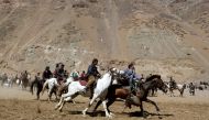 Afghan horsemen compete during a Buzkashi game in Panjshir province, north of Kabul, Afghanistan April 7, 2017. REUTERS/Omar Sobhani