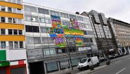 This picture taken on April 3, 2017 shows The Haus (The House), an old bank building housing an urban art project in Berlin. In Berlin, arguably Europe's urban art capital, some 165 like-minded street artists have filled the five-storey space with their w