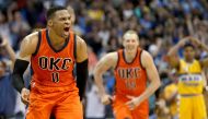 Russell Westbrook #0 of the Oklahoma City Thunder celebrates after scoring a game-winning, three-point shot at the buzzer against the Denver Nuggets at Pepsi Center on April 9, 2017 in Denver, Colorado. Matthew Stockman/ AFP
