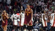 Cleveland Cavaliers forward Channing Frye (8) react after Miami Heat players celebrate their 124-121 overtime win at American Airlines Arena. The Heat won 124-121 in overtime. Steve Mitchell
