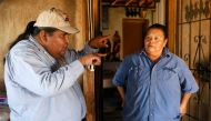 Verlon Jose (L), vice-chairman of the Tohono O'odham Nation, talks to his cousin Francine Jose on her family ranch near the U.S.-Mexico border on the Tohono O'odham reservation in Chukut Kuk, Arizona April 6, 2017. Picture taken April 6, 2017. REUTERS/Ric