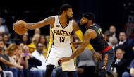 Apr 12, 2017; Indianapolis, IN, USA; Indiana Pacers forward Paul George (13) is guarded by Atlanta Hawks guard Malcolm Delaney (5) at Bankers Life Fieldhouse. Indiana defeats Atlanta 104-86. Brian Spurlock
