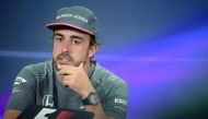 McLaren Honda's Spanish driver Fernando Alonso attends the drivers press conference ahead of the Formula One Bahrain Grand Prix at the Sakhir Circuit in the desert south of the Bahraini capital, Manama