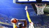 LeBron James (left) of the Cleveland Cavaliers goes to the basket against Paul George of the Indiana Pacers in the second quarter of Game Five of the NBA Eastern Conference First Round during the 2017 NHL Stanley Cup Playoffs at Bankers Life Fieldhouse in