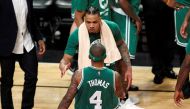 Boston Celtics forward Gerald Green (30) and guard Isaiah Thomas (4) celebrate during the second half in game three of the first round of the 2017 NBA Playoffs against the Chicago Bulls at United Center. Credit: Caylor Arnold
