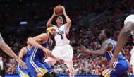 Portland Trail Blazers guard CJ McCollum (3) shoots over Golden State Warriors in the second half of game three of the first round of the 2017 NBA Playoffs at Moda Center. Jaime Valdez