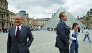 This file photo taken on June 22, 2006 in the Napoleon courtyard of the Louvre museum in Paris shows US-Chinese architect of the Louvre Pyramid Ieoh Ming Pei (L) and the French Culture Minister Renaud Donnedieu de Vabres posing for photographers. Pei, arc