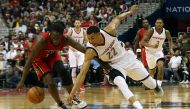 Atlanta Hawks forward Taurean Prince (12) and Washington Wizards forward Otto Porter Jr. (22) battle fora loose ball in the third quarter in game five of the first round of the 2017 NBA Playoffs at Verizon Center. Mandatory Credit: Geoff Burke-USA TODAY S