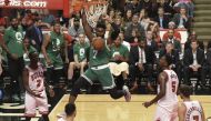 Boston Celtics forward Jaylen Brown (7) dunks against the Chicago Bulls during the second half in game six of the first round of the 2017 NBA Playoffs at United Center.  David Banks
