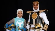 Muslim cosplay enthusiasts Azlyna Zaina (L) and Raja Mohd Rusydi, dressed as 