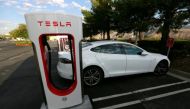 A Tesla Model S charges at a Tesla Supercharger station in Cabazon, California, US May 18, 2016. Reuters/Sam Mircovich/File Photo