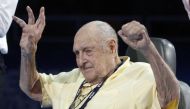 Adolph Kiefer, winner of the 1936 Olympic gold medal for the men's 100m backstroke, raises his arms before the medal ceremoney during the U.S. Olympic swimming trials in Omaha, Nebraska, June 27, 2012. REUTERS/Jeff Haynes