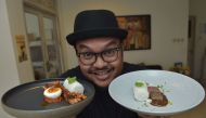 This picture taken on January 18, 2017 shows Indonesian food stylist Dade Akbar displaying some of his food in Jakarta. AFP / ADEK BERRY 