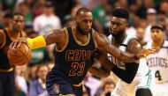 LeBron James #23 of the Cleveland Cavaliers handles the ball in the second half against the Boston Celtics during Game One of the 2017 NBA Eastern Conference Finals at TD Garden on May 17, 2017 in Boston, Massachusetts.   Elsa/AFP
