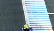 Movistar Yamaha MotoGP’s Italian rider Valentino Rossi in action during the Japanese Grand Prix at the Twin Ring Motegi Circuit in Motegi in this file photo.