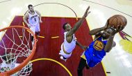 Golden State Warriors forward Kevin Durant (right) shoots the ball against Cavaliers JR Smith (5) in game 3 of the 2017 NBA Finals on Wednesday.