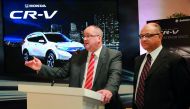 Greig Roffey (left), Sales and Marketing Manager, Doha Marketing Services Company (Domasco), and Amr Farag, Honda Operations Manager, Domasco, addressing the media at the launch of the all-new Honda CR-V, at the Domasco showroom in Doha.  Pic: Salim Matra