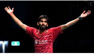 Kidambi Srikanth of India celebrates after defeating Chen Long of China in the Australian Open men's singles badminton final in Sydney on June 25, 2017. AFP / William West