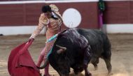 Spanish matador Alberto Aguilar performs a pass on an Adolfo Martin Andres bull at Plumacon arena in Mont de Marsan during the festival of La Madeleine, southwestern France, on July 23, 2017. AFP / Iroz Gaizka