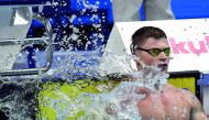 Great Britain’s Adam Peaty reacts after making a new world record in a heat of the men’s 50m breaststroke during the swimming competition at the 2017 FINA World Championships in Budapest, yesterday.