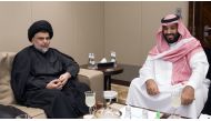 Crown Prince Mohammed bin Salman (R) receiving prominent Iraqi Shiite cleric Moqtada al-Sadr in Jeddah on July 30, 2017.  AFP Photo/Saudi Royal Palace/Bandar Al-Jaloud