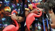 Don and Nancy Featherstone hold their creation, the pink flamingo lawn ornament, at Harvard University in Cambridge, Massachusetts September 20, 2012. Jessica Rinaldi/Reuters