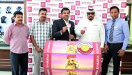 The officials of Joyalukkas announcing the winners of grand 60kg gold promotion. 