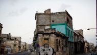 A view of a graffiti by Cuban Artist Yulier Rodriguez in Havana, Cuba, August 4, 2017. Reuters/Alexandre Meneghini

