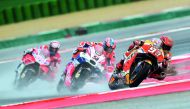 Repsol Honda Team’s Spanish rider Marc Marquez (right) leads ahead of Ducati Team’s Italian riders Danilo Petrucci (centre) and Andrea Dovizioso during the San Marino Moto GP event at the Marco Simoncelli Circuit in Misano yesterday.