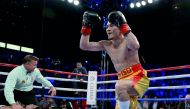 Srisaket Sor Rungvisai of Thailand celebrates as Roman Gonzalez of Nicaragua is knocked out at StubHub Center in Carson, California on Saturday.