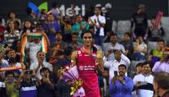 India's Pusarla V Sindhu poses on the podium during an awards ceremony after the women's singles final match against Japan's Nozomi Okuhara at the Korea Open Badminton Superseries in Seoul on September 17, 2017. (AFP / JUNG Yeon-Je)