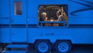 Joanne Molnar, 64, and husband Mark, 62, pictured on June 22 in the RV that has been their home for several years, managed a camping park in Trenton, Maine, for the summer season. Washington Post photo by Linda Davidson.