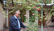 Uzbek dissident writer Nurulloh Muhammad Raufkhon, who was released by police on Sunday from exile on charges of spreading anti-government propaganda, is seen in the courtyard of his house in Tashkent, Uzbekistan October 2, 2017. Reuters/Mukhammadsharif M