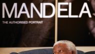 (FILES) This file photo taken on October 09, 2006, shows South Africa's former President Nelson Mandela attending the launch of his new book Mandela: The Authorised Portrait, in Johannesburg. AFP / ALEXANDER JOE