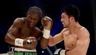 (FILES) This file photo taken on May 20, 2017 shows Hassan N'Dam of France (L) and Ryota Murata of Japan exchanging blows during the 10th round of the WBA middleweight title bout in Tokyo. AFP / Toru YAMANAKA
