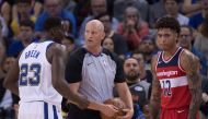 Golden State Warriors forward Draymond Green (23) argues with NBA referee Eric Dalen (37) in front of Washington Wizards forward Kelly Oubre Jr. (12) during the second quarter at Oracle Arena.  Kyle Terada
