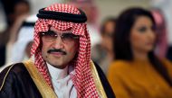 FILE PHOTO - Saudi billionaire Prince AlWaleed bin Talal looks on during a news briefing in Manama, May 8, 2012. REUTERS/Hamad I Mohammed/File Photo
