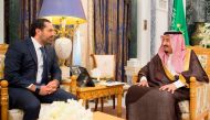 A handout picture provided by the Saudi Royal Palace on November 6, 2017, shows King Salman bin Abdulaziz al-Saud (R) meeting with former Lebanese prime minister Saad Hariri in Riyadh. AFP / Saudi Royal Palace