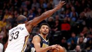 Jamal Murray #27 of the Denver Nuggets drives to the basket against Dante Cunningham #33 of the New Orleans Pelicans at the Pepsi Center on November 17, 2017 in Denver, Colorado. Matthew Stockman/AFP
