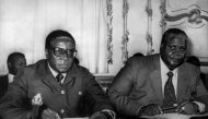 Patriotic Front leaders Robert Mugabe (L) and Joshua Nkomo (R) posing prior the opening of the British convened Rhodesian Constitutional Conference at Lancaster House, in London on September 10, 1979 AFP / UPI / Pete Skingley